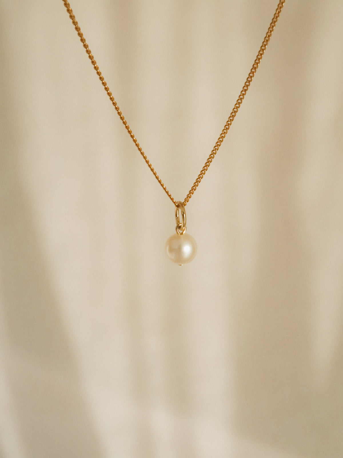 Small pearl charm