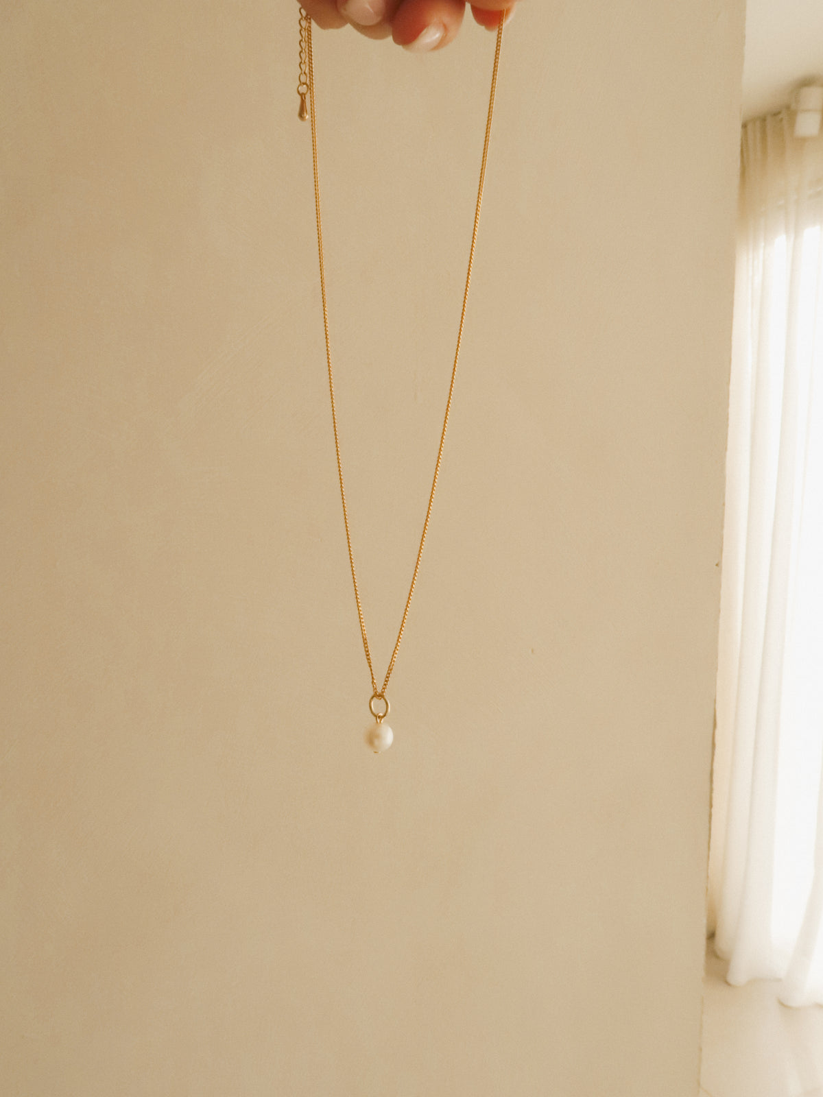 Small pearl charm