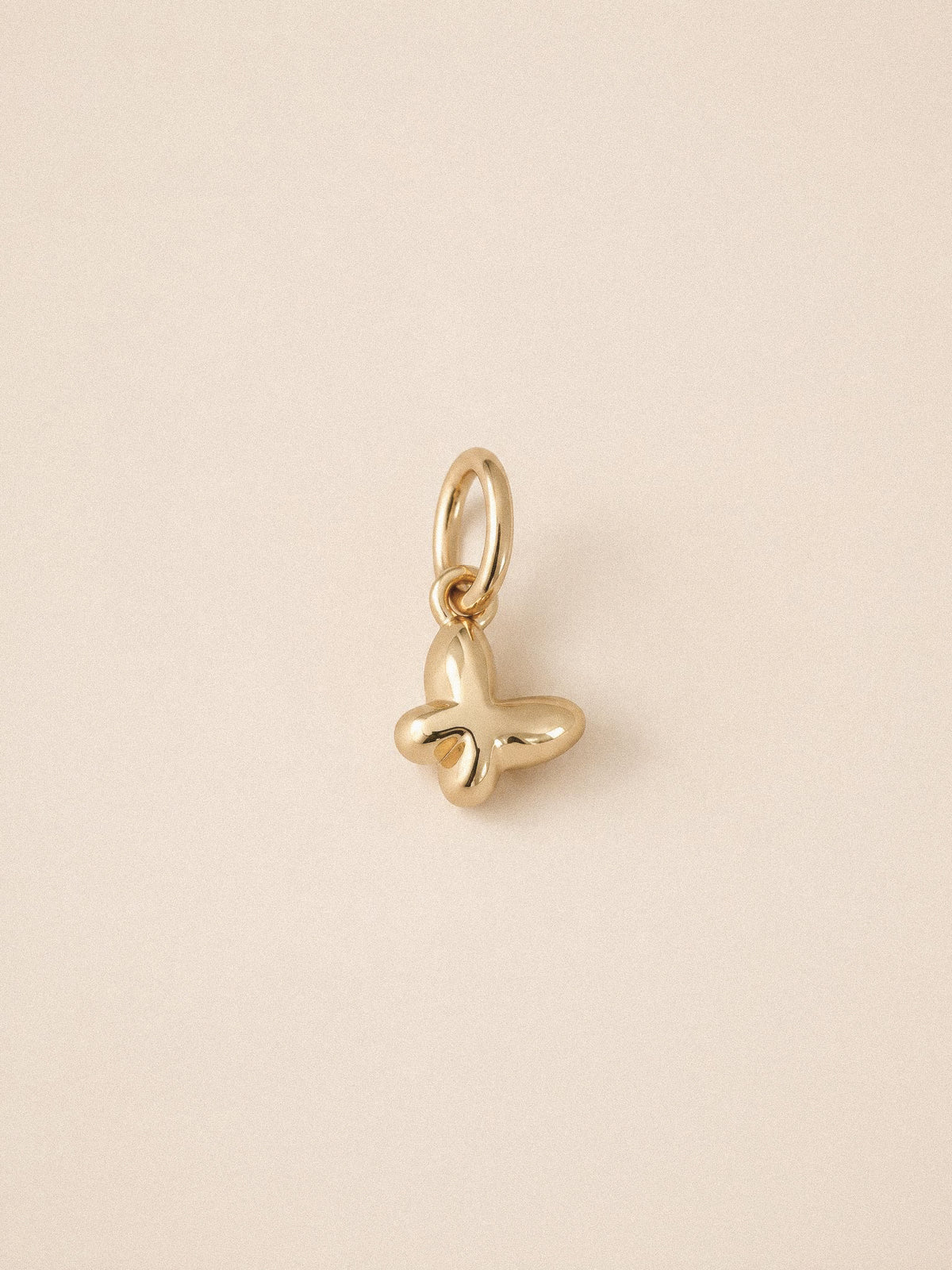 Vlinder charm goud