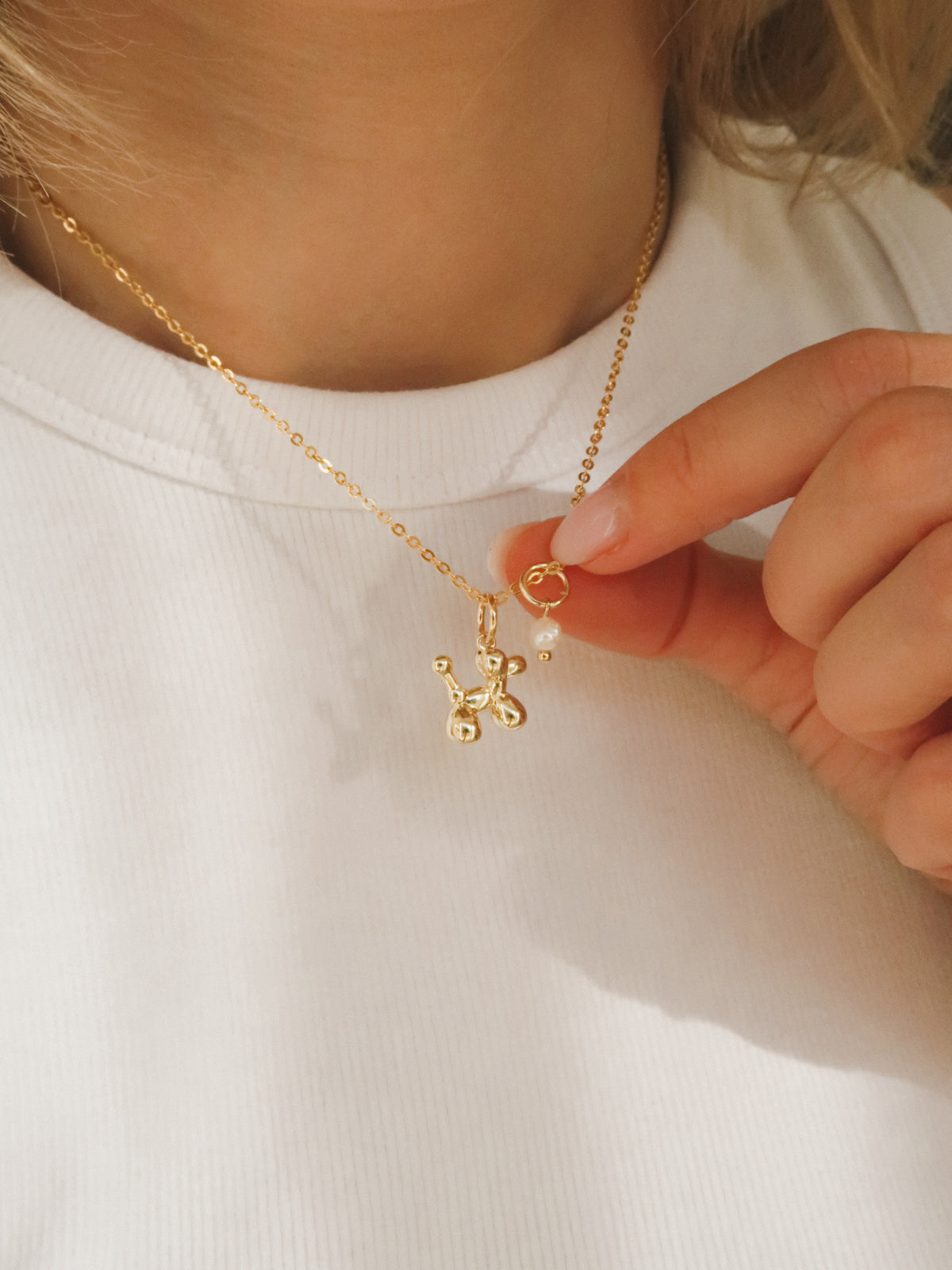 Mini pearl charm