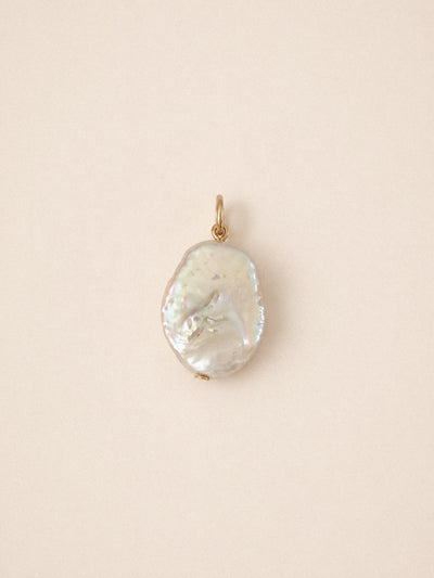 Flat pearl charm